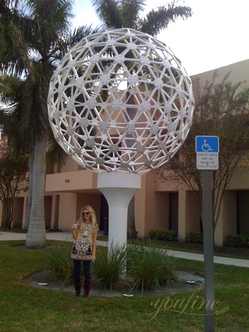 modern metal golf ball sculpture