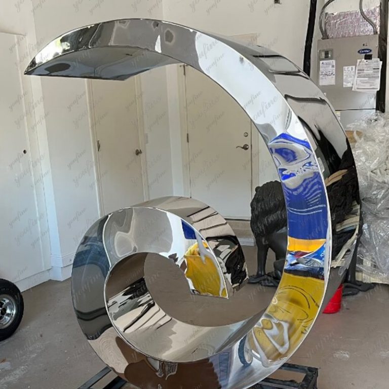 Customer feedback image showing a mirror stainless steel sculpture, image 1