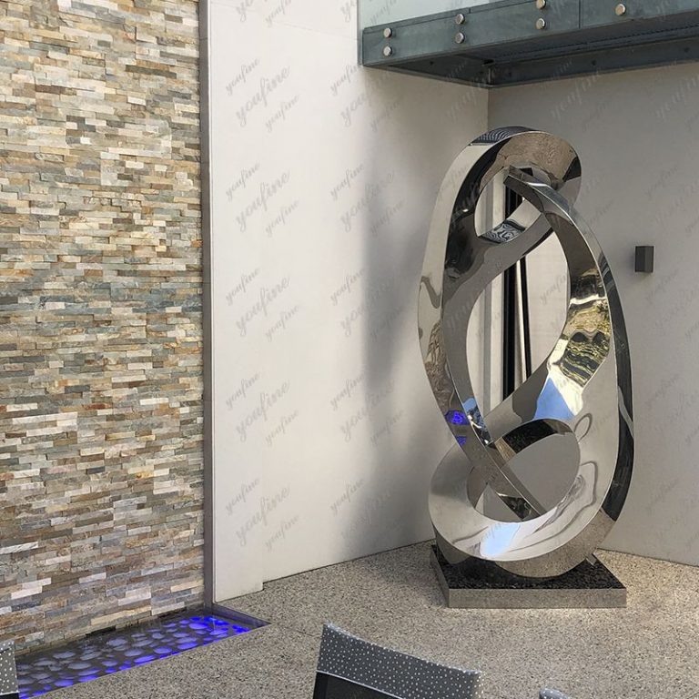Customer feedback image showing a mirror stainless steel sculpture, image 8