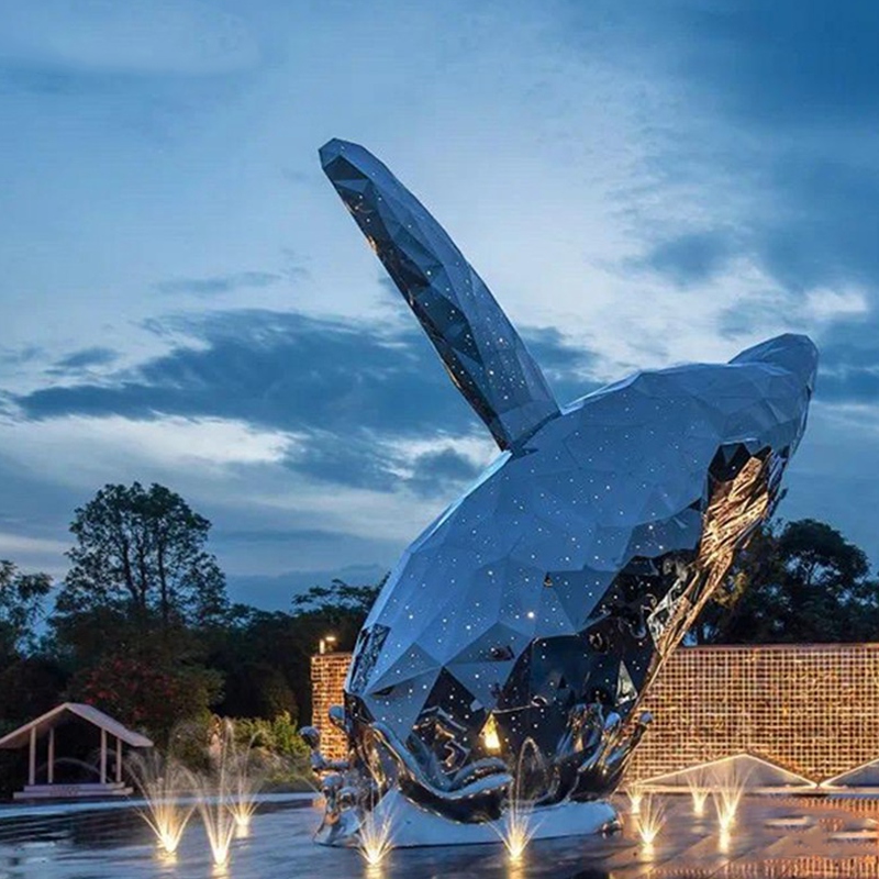 modern metal whale sculpture made of stainless steel