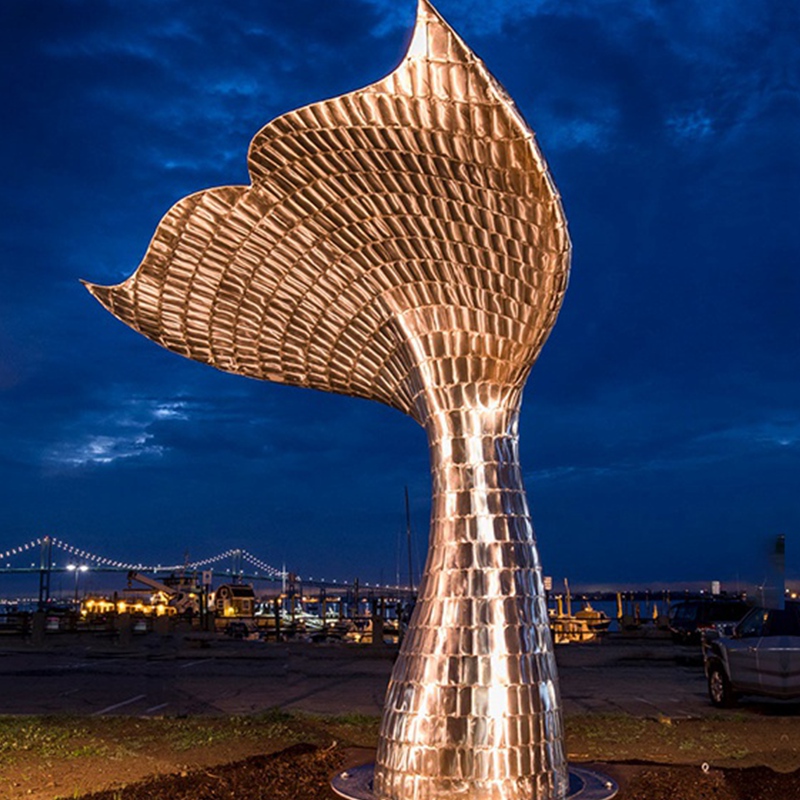 modern metal whale sculpture made of stainless steel