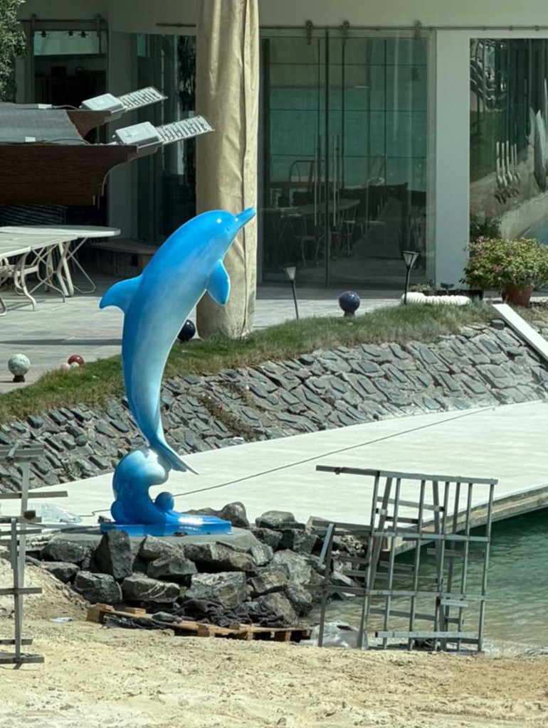 color sculpture feedback - blue dolphin sculpture