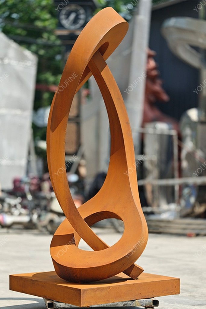 large corten steel abstract sculpture