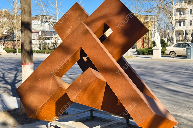 geometric corten steel abstract sculpture