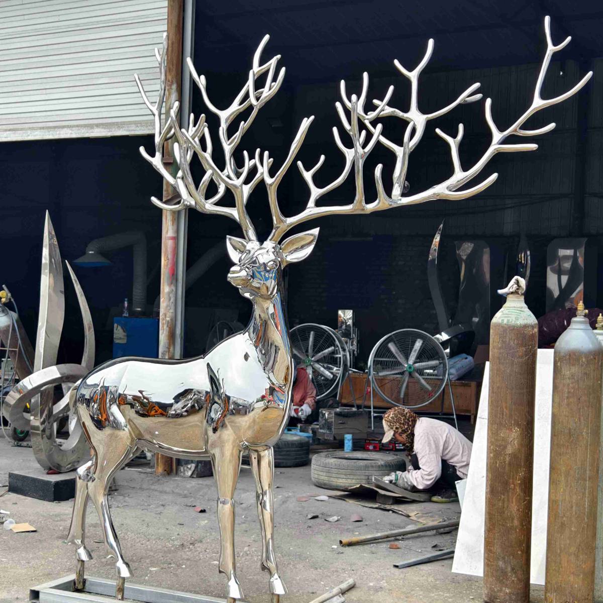 finished stainless steel deer sculpture inside YouFine factory