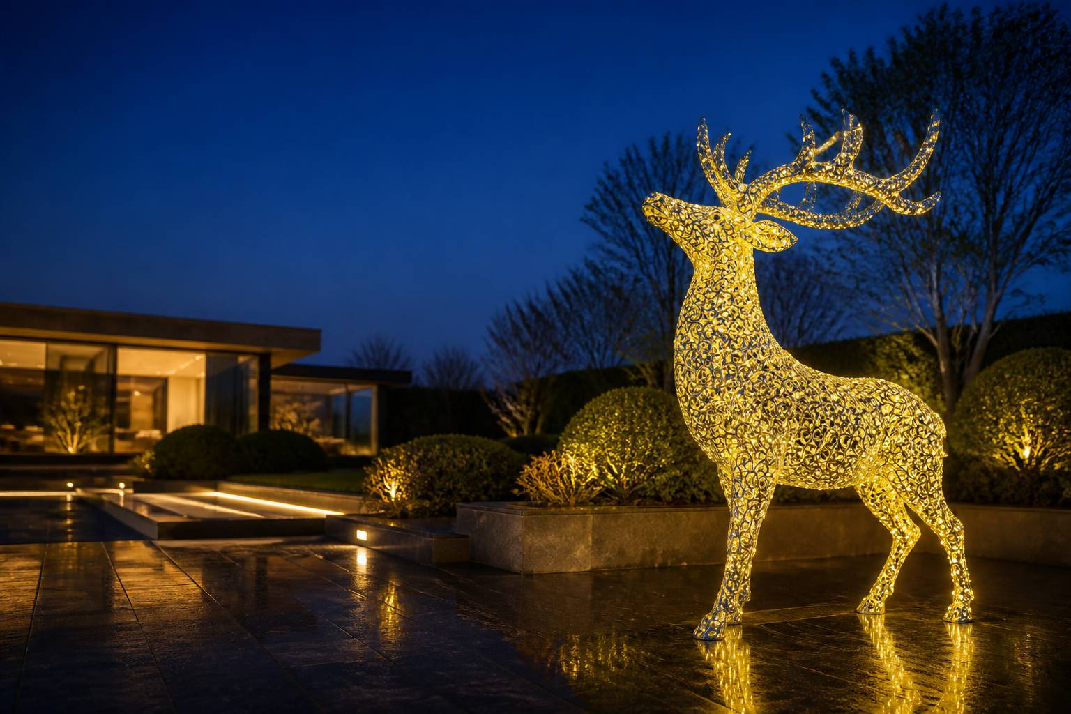 illuminated metal deer sculpture with night lighting