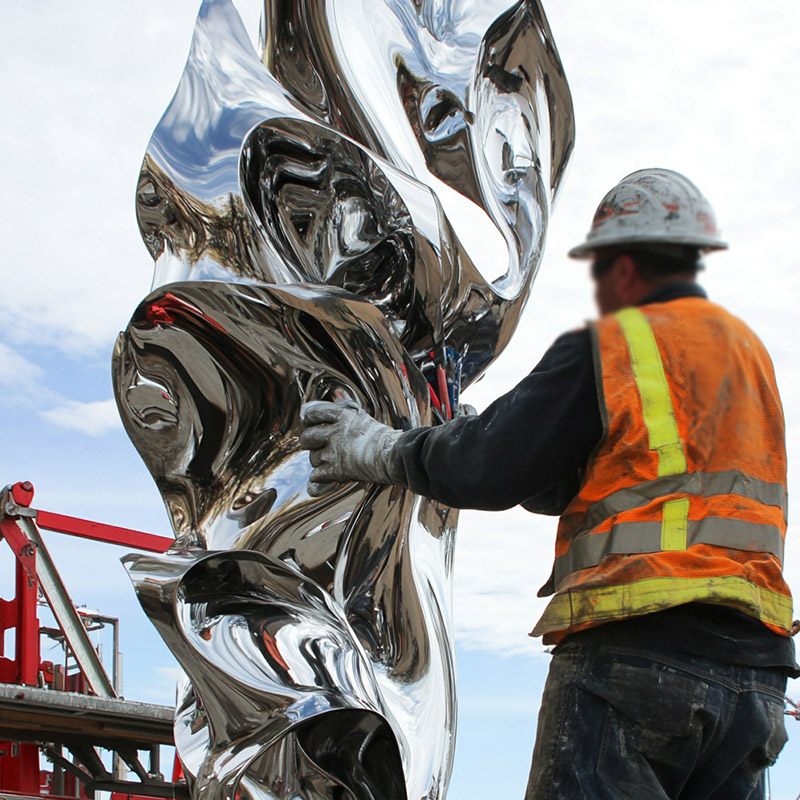 high polish stainless steel sculpture install