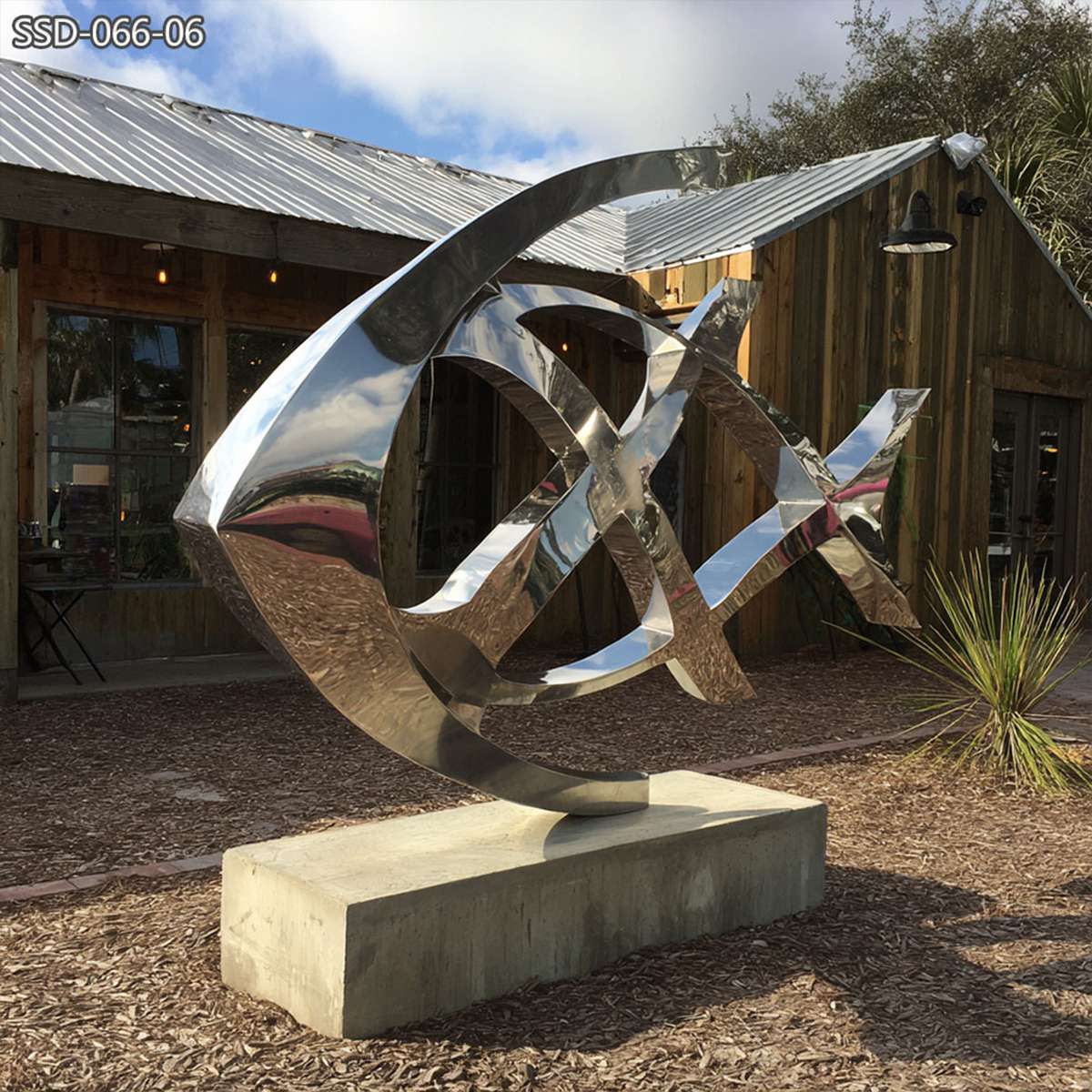 modern abstract stainless steel fish sculpture