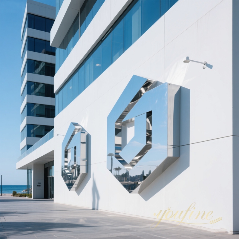 modern mirror polished stainless steel logo sculpture for wall