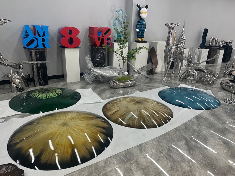 The Real Difference Between Buying Stainless Steel Sculptures in China and the U.S. (You’ll Be Surprised) - News - 3 stainless steel abstract sculptures in showroom