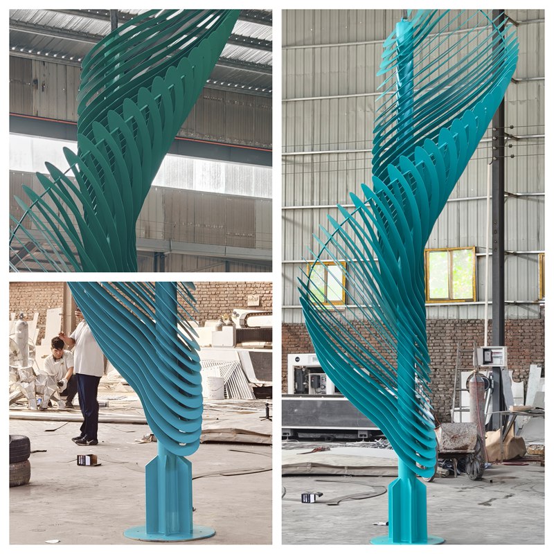 Large outdoor colorful abstract sculpture in factory