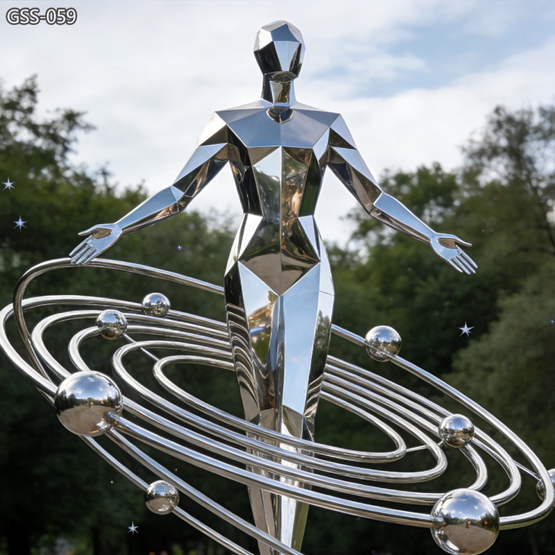 Stainless Steel Abstract Human Sculpture with Planet - Stainless Steel Figure Statue - 3 Stainless steel abstract outdoor sculpture depicting a figure surrounded by planetary rings.