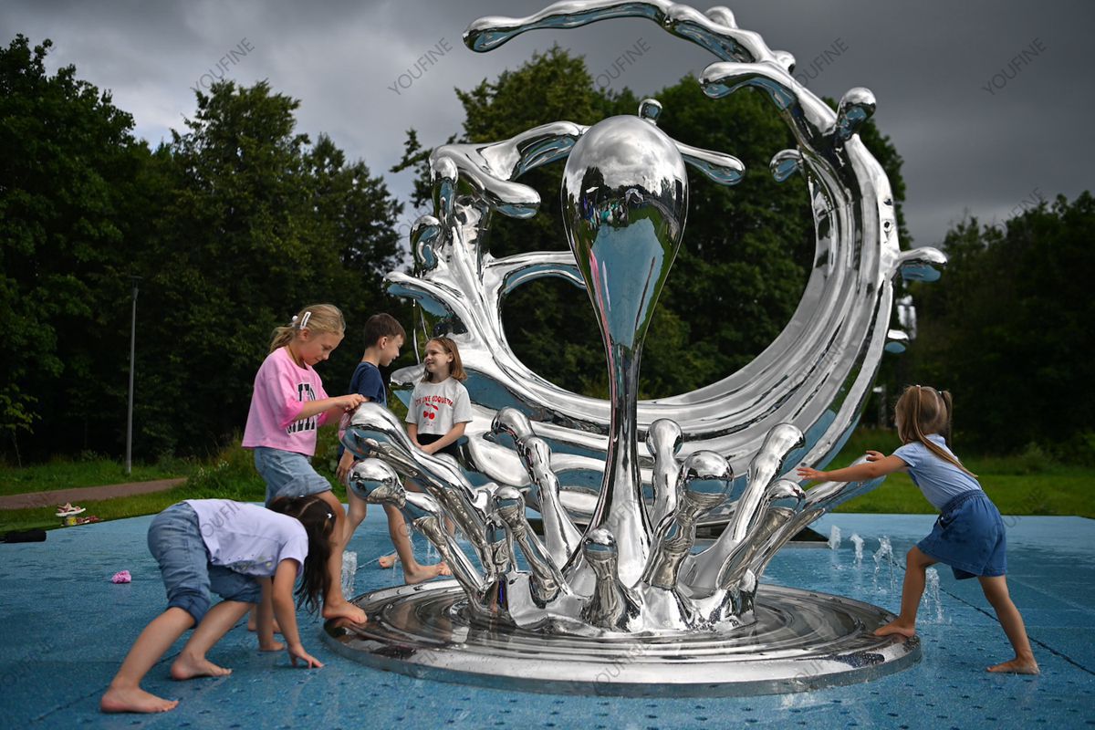 Moscow Public Park Sculpture Project - - 38 Visitors interacting with stainless steel sculpture in Moscow park