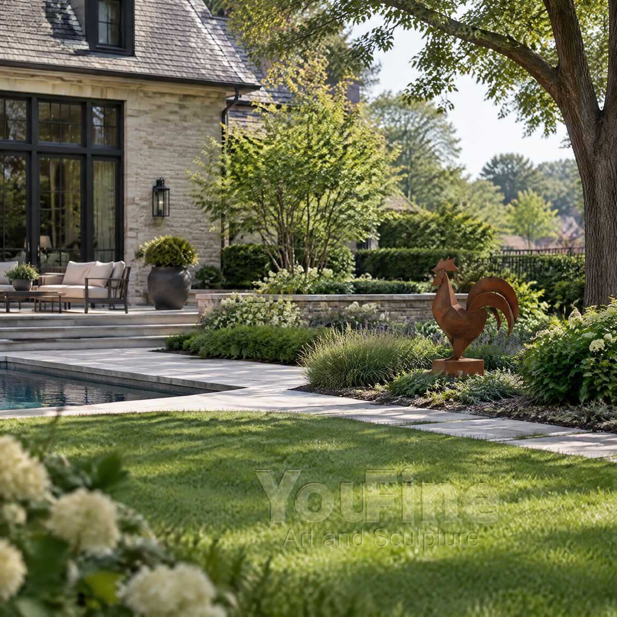 Metal rooster sculpture with corten finish beside a garden pool
