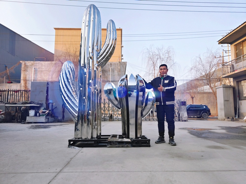 Factory scale reference for a custom stainless steel cactus sculpture